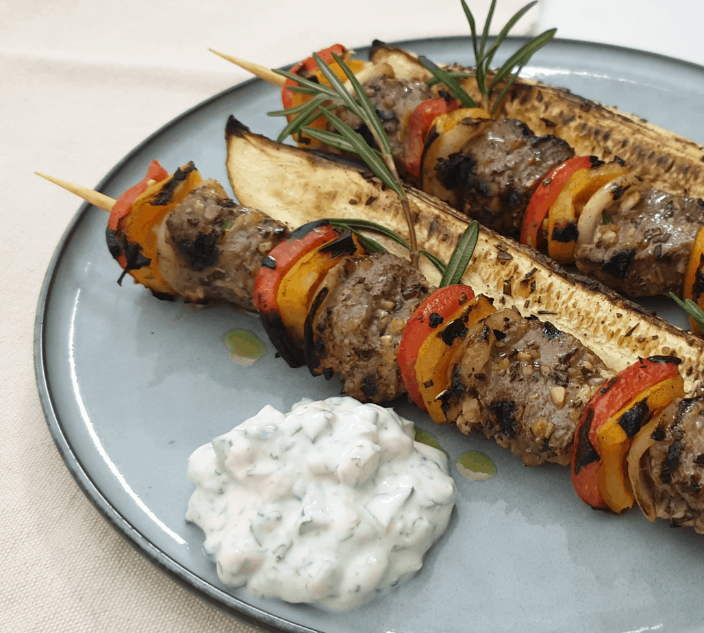 Lamb skewers with rosemary-garlic and grilled marrow