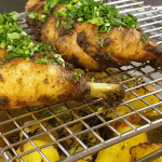 Baked chicken legs with baby potatoes
