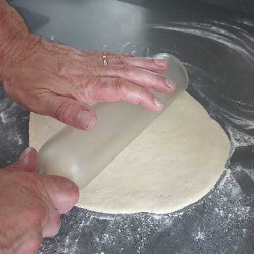 rolling pizza dough