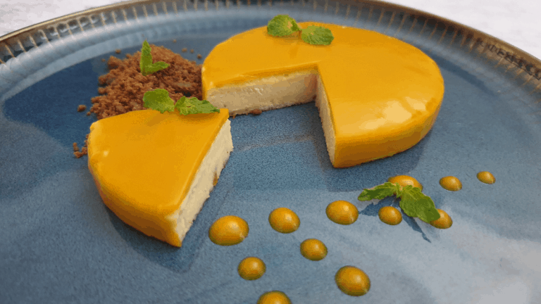 Brillat-Savarin cheesecake with mango coulis