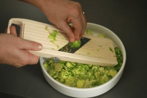 shaving brussels sprouts with mandoline slicer