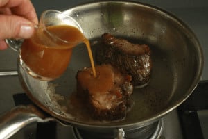 pour sauce over beef