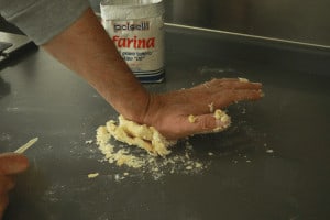 mixing dough with firm hand