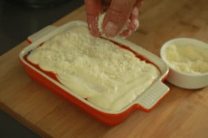 sprinkle parmesan cheese on canneloni
