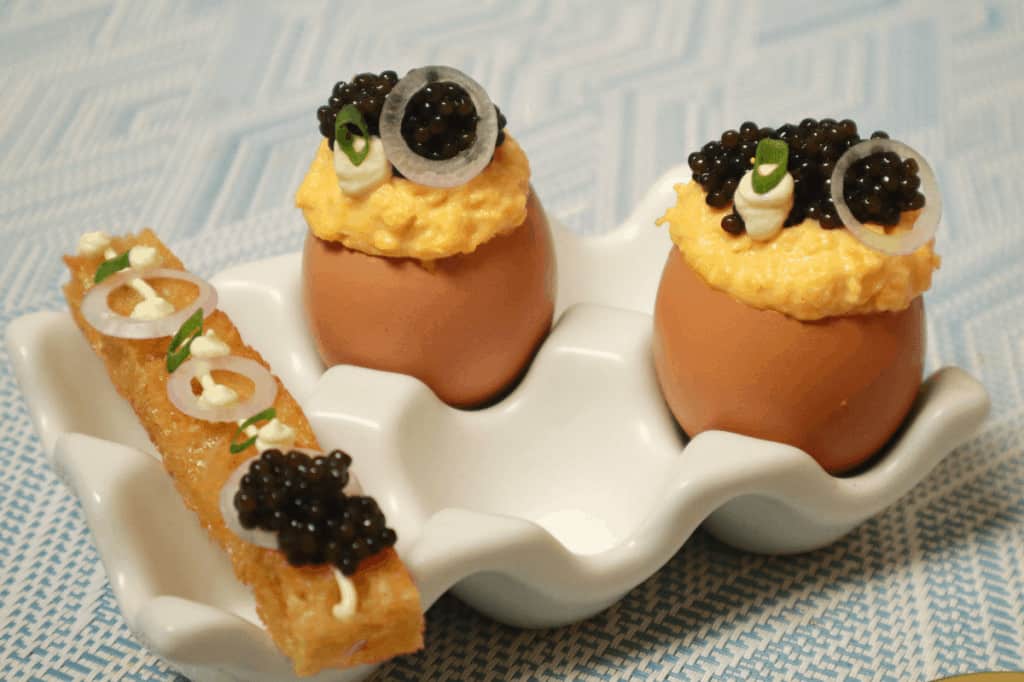 scrambled eggs with caviar on toast