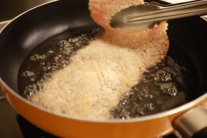 pan frying a veal escalope