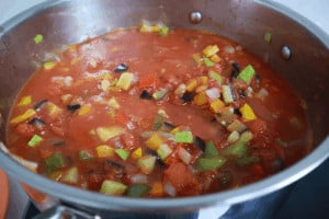 cooking mixed vegetables wth tomatoes for ratatouille
