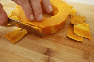 peeling steamed pumpkin