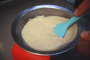 pass artichoke soup through a sieve or strainer