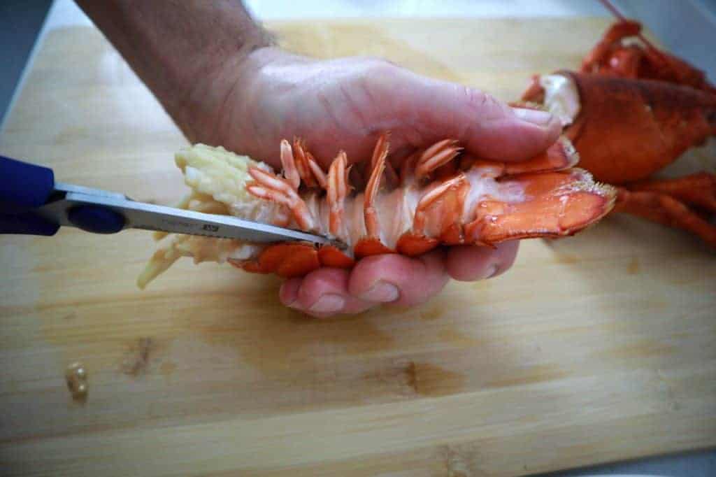 poached lobster cutting the shell