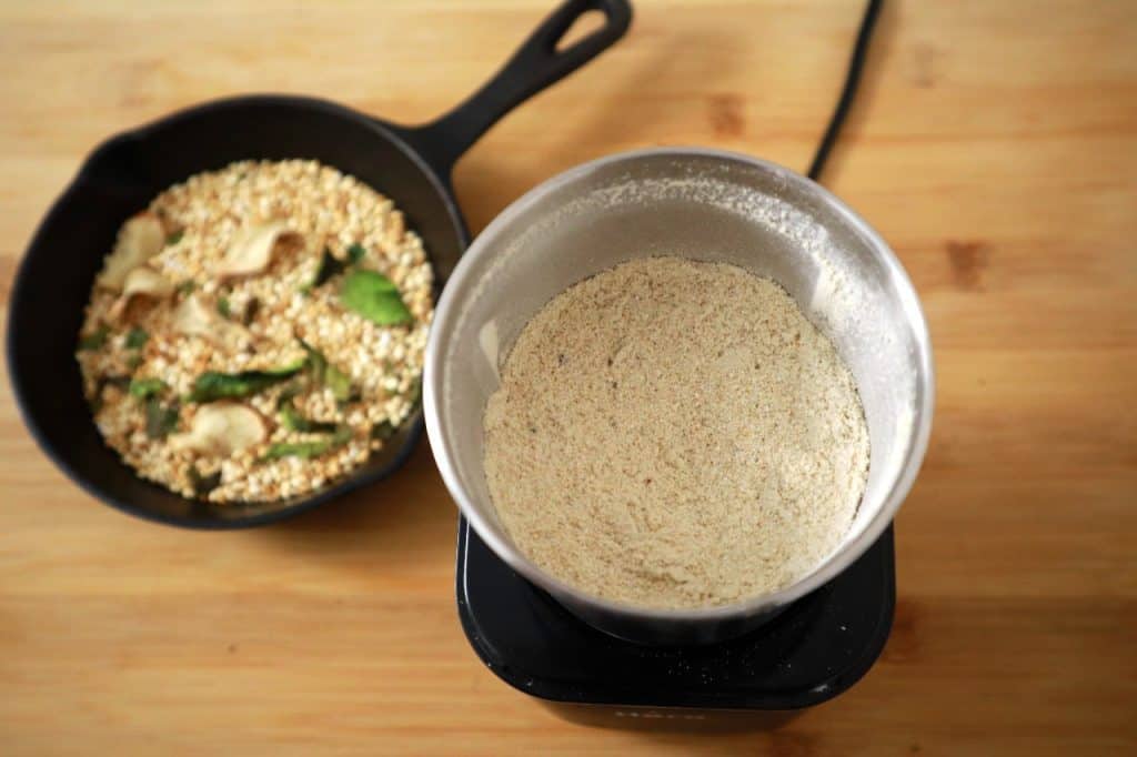 sticky rice powder ingredients in grinder sticky rice powder - an essential ingredient in thai salads - sticky rice powder 4 grinded 1024x682 - Sticky Rice Powder &#8211; an Essential Ingredient in Thai Salads