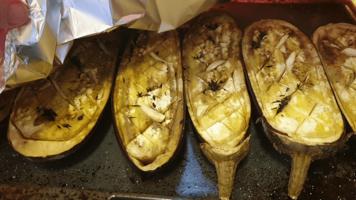 scored eggplants in oven