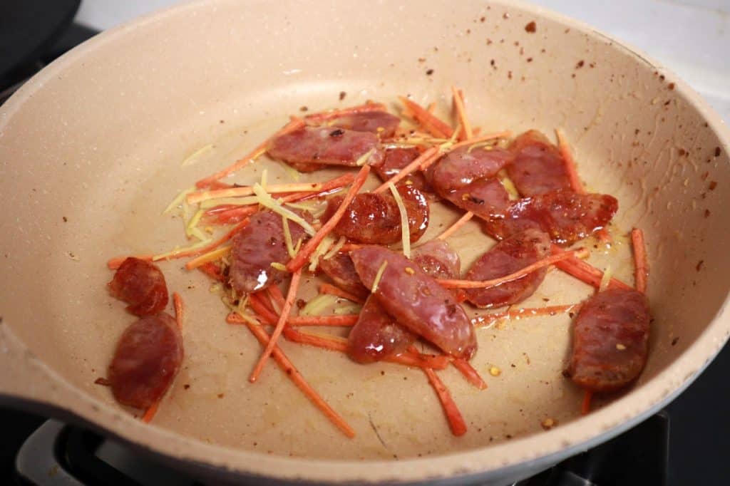 Stir Fried Garlic Scapes with Chinese Sausage Culinary Ambition