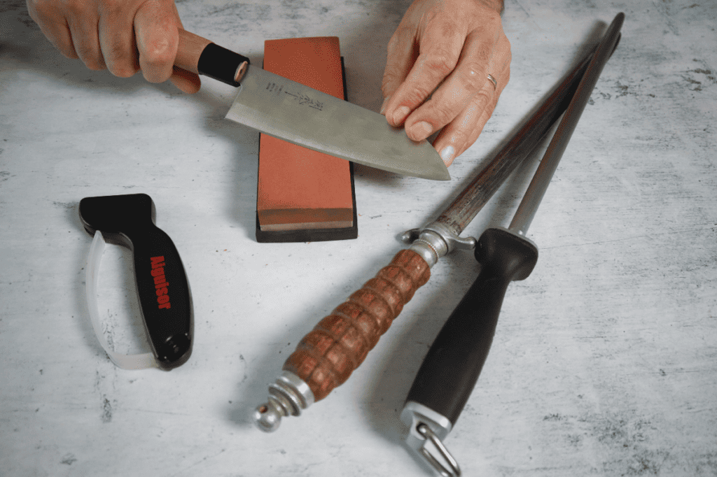 sharpening a knife with a whetstone